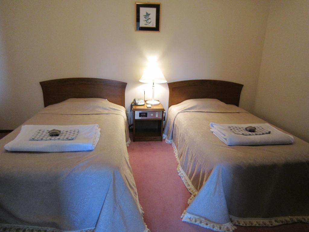 San Hotel Koromogawaso Хирайзуми Стая снимка