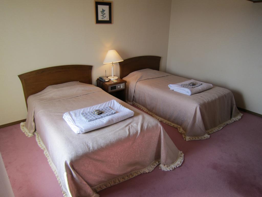San Hotel Koromogawaso Хирайзуми Стая снимка